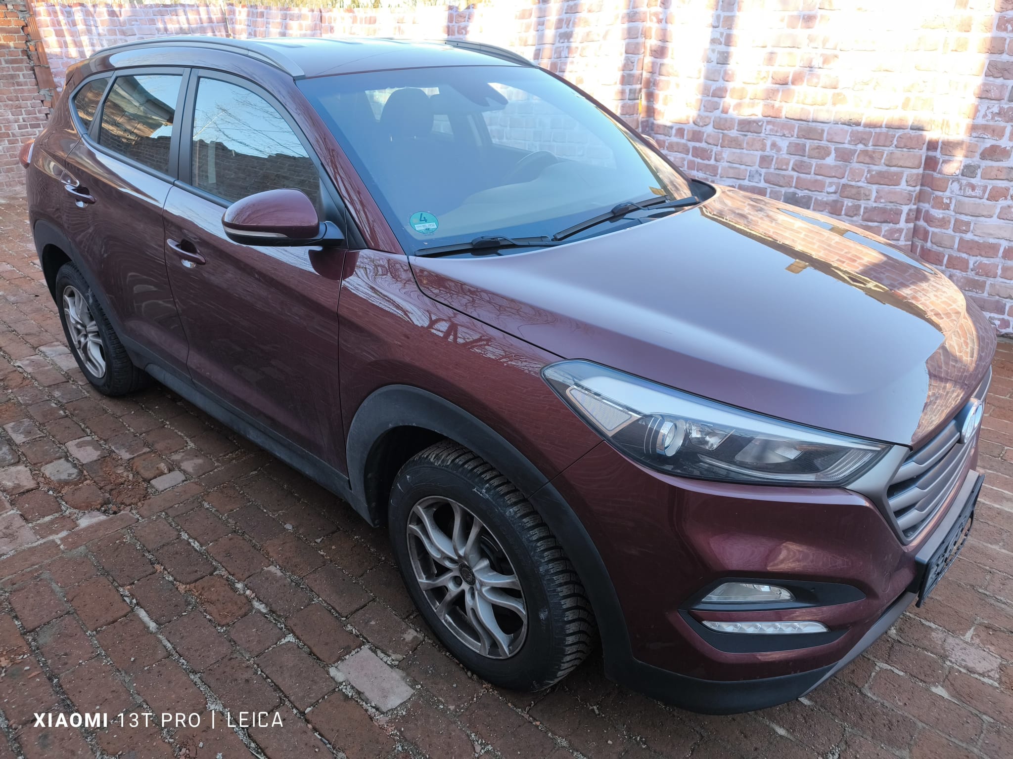 Hyundai Tucson SUV in Bordeauxrot als bereits verkaufter Gebrauchtwagen für Auto verkaufen in Langenhagen