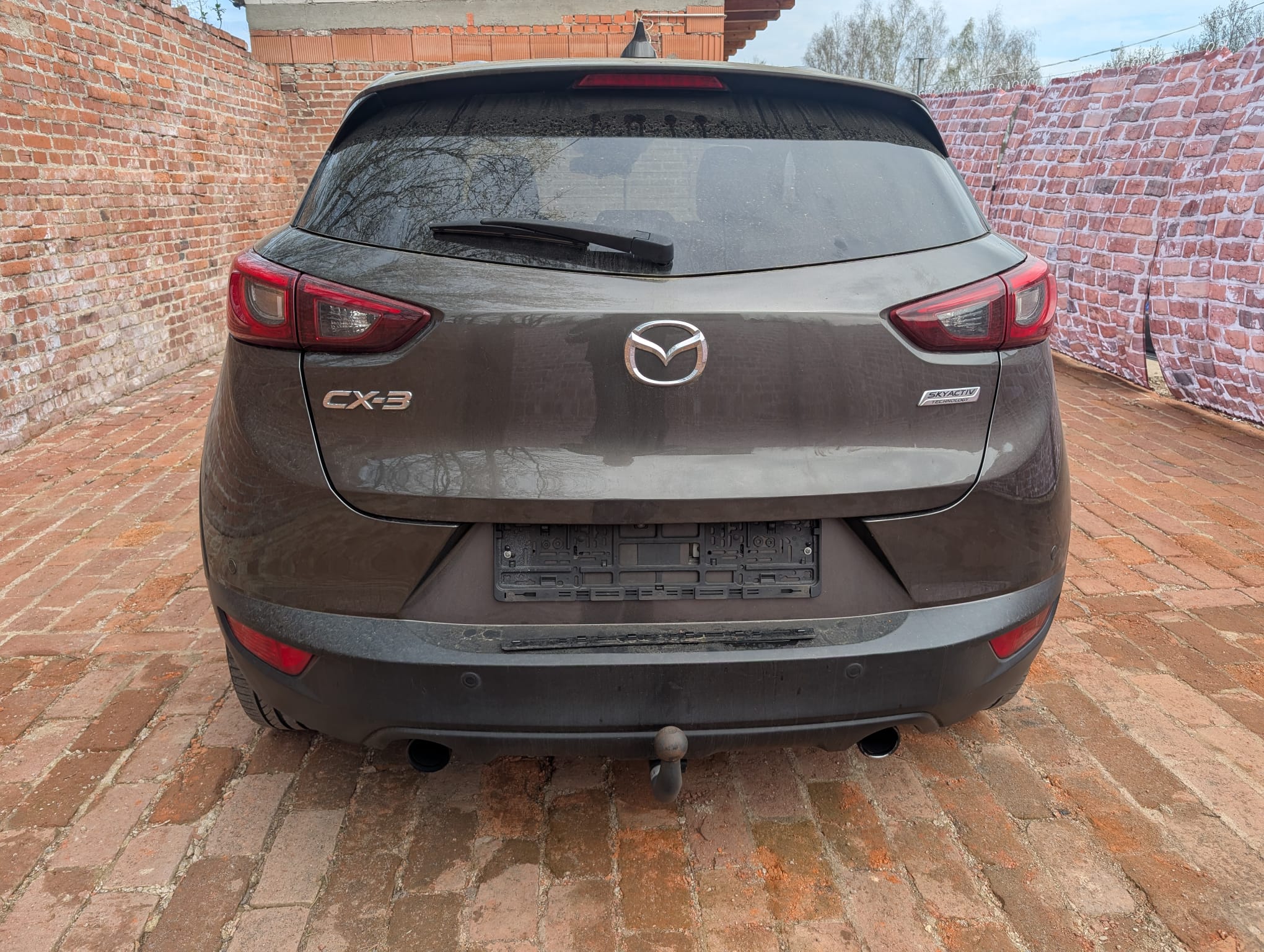 Mazda CX-3 aus Waiblingen von hinten fotografiert zum Auto verkaufen über direkten Kontakt