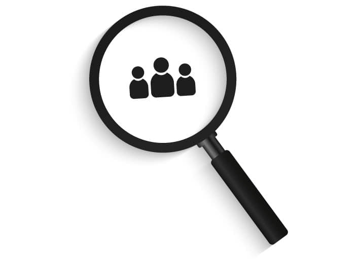 Suche mit der Lupe nach Menschen auf Jobsusche